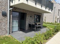 Hauptbild Ankerplatz Tossens - Ihre Luxus Ferienwohnung mit eigener Sauna, überdachter Terrasse und Stellplatz